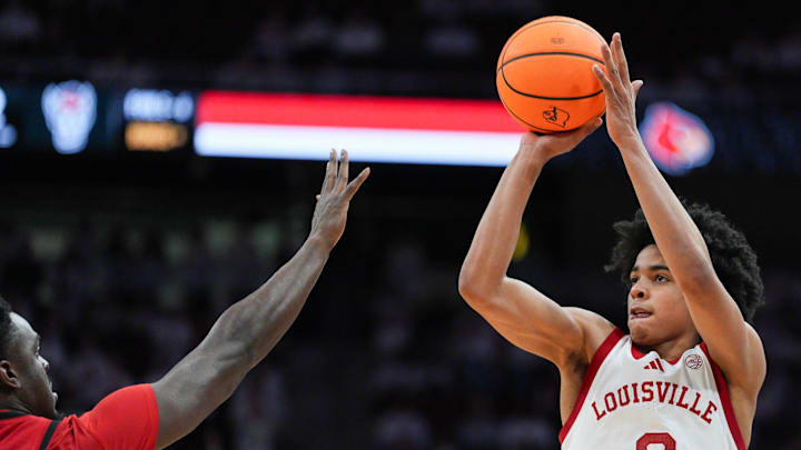 Louisville Cardinals guard Mikel Brown Jr. (0) scored 45 points with 10-for-16 3-point shooting as the Cards roll past NC State 118-77 at the KFC Yum! Center in downtown Louisville February 9, 2026. Brown Jr. tied Louisville legend Wes Unseld's game record.
