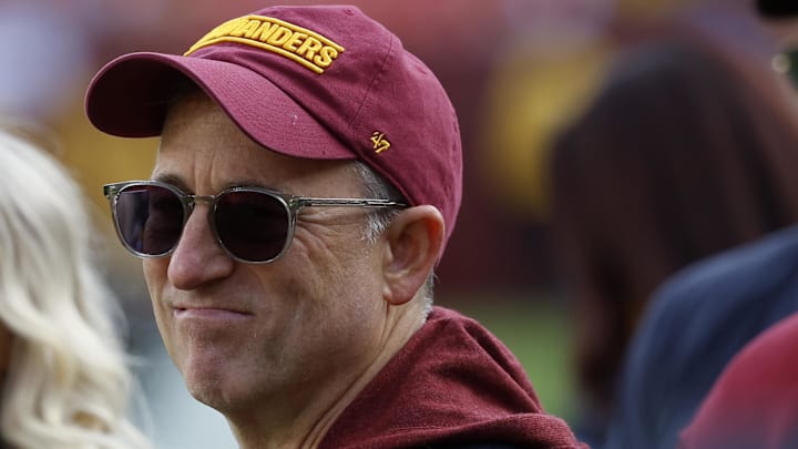 Washington Commanders owner Josh Harris stands on the field prior to the game against the Dallas Cowboys at Northwest Stadium. Mandatory Credit: Geoff Burke-Imagn Images