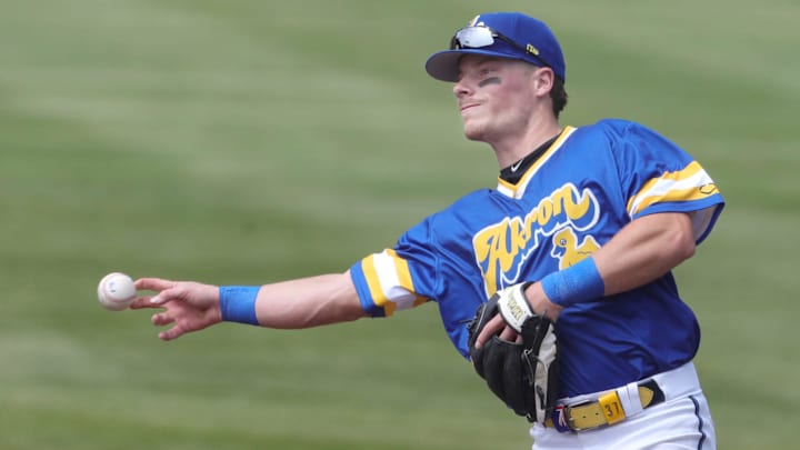RubberDucks second baseman Travis Bazzana throws to first base to retire an Altoona Curve runner on April 13, 2025, in Akron, Ohio. RubberDucks second baseman Travis Bazzana throws to first base to retire an Altoona Curve runner on April 13, 2025, in Akron, Ohio.