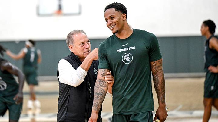 Michigan State's coach Tom Izzo, left, jokes with injured transfer Kaleb Glenn during the first day of basketball practice on Monday, Sept. 22, 2025, at the Breslin Center in East Lansing. Michigan State's coach Tom Izzo, left, jokes with injured transfer Kaleb Glenn during the first day of basketball practice on Monday, Sept. 22, 2025, at the Breslin Center in East Lansing.