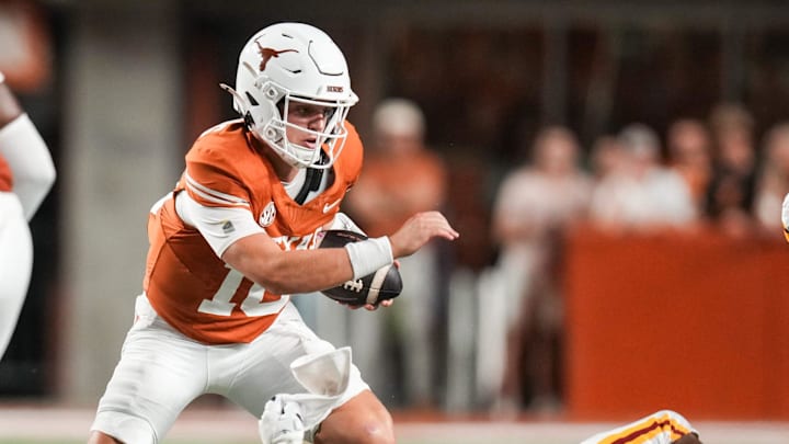 Texas Longhorns quarterback Arch Manning (16) advances the ball as the Texas Longhorns take on ULM at Darrell K Royal-Texas Memorial Stadium in Austin Saturday, Sept. 21, 2024.