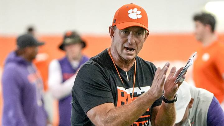 Clemson head coach Dabo Swinney encourages his players stretching during practice in the at the Allen N. Reeves Sports Complex in Clemson, S.C. Thursday, August 6, 2026.