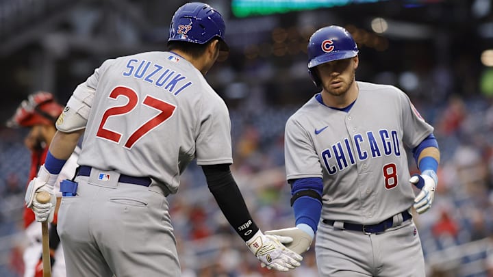 Aug 15, 2022; Washington, District of Columbia, USA; Chicago Cubs left fielder Ian Happ (8) celebrates with Cubs right fielder Seiya Suzuki (27) after hitting a home run against the Washington Nationals during the first inning at Nationals Park.