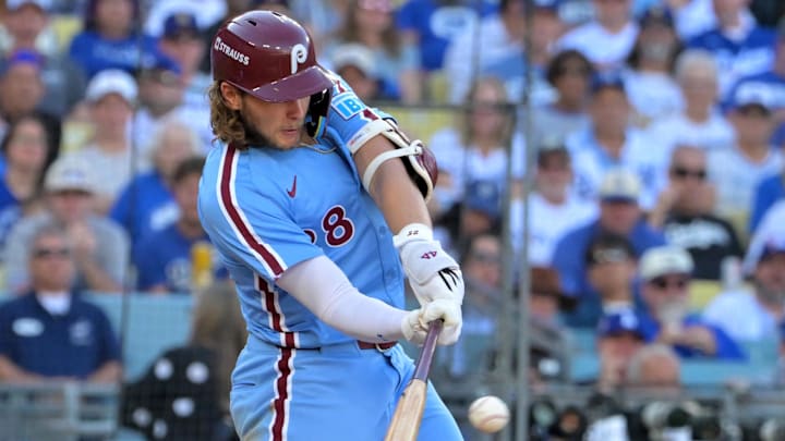 Oct 9, 2025; Los Angeles, California, USA; Philadelphia Phillies third baseman Alec Bohm (28) singles in the sixth inning against the Los Angeles Dodgers during game four of the NLDS round for the 2025 MLB playoffs at Dodger Stadium. Mandatory Credit: Jayne Kamin-Oncea-Imagn Images Oct 9, 2025; Los Angeles, California, USA; Philadelphia Phillies third baseman Alec Bohm (28) singles in the sixth inning against the Los Angeles Dodgers during game four of the NLDS round for the 2025 MLB playoffs at Dodger Stadium. Mandatory Credit: Jayne Kamin-Oncea-Imagn Images