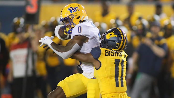 Pittsburgh Panthers Bub Means (0) hauls in a pass while being covered by West Virginia Mountaineers Beanie Bishop Jr. (11) during the first half at Milan Puskar Stadium in Morgantown, WV on September 16, 2023.