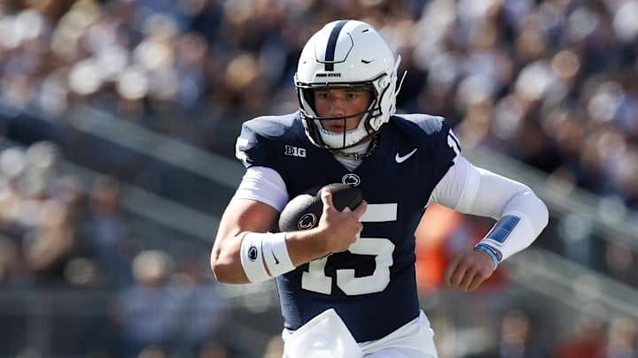 Aug 30, 2025; University Park, Pennsylvania, USA; Penn State Nittany Lions quarterback Drew Allar (15) runs with the ball during the first quarter against the Nevada Wolf Pack at Beaver Stadium. Mandatory Credit: Matthew O'Haren-Imagn Images