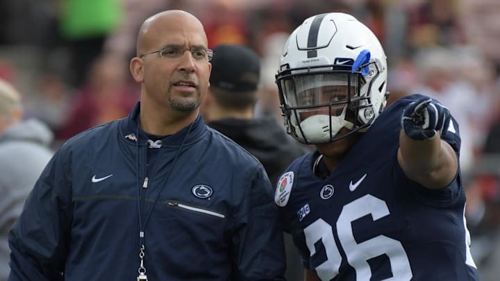 Penn State Nittany Lions head coach James Franklin talks with running back Saquon Barkley (26) before the game between the Penn State Nittany Lions and the USC Trojans at the 2017 Rose Bowl. 