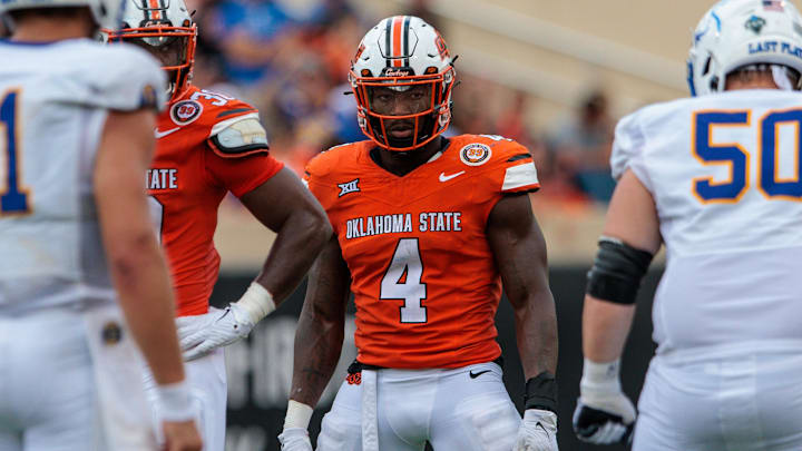 Aug 31, 2024; Stillwater, Oklahoma, USA; Oklahoma State Cowboys linebacker Nick Martin (4) ready for a play during the fourth quarter against the South Dakota State Jackrabbits at Boone Pickens Stadium. Mandatory Credit: William Purnell-Imagn Images