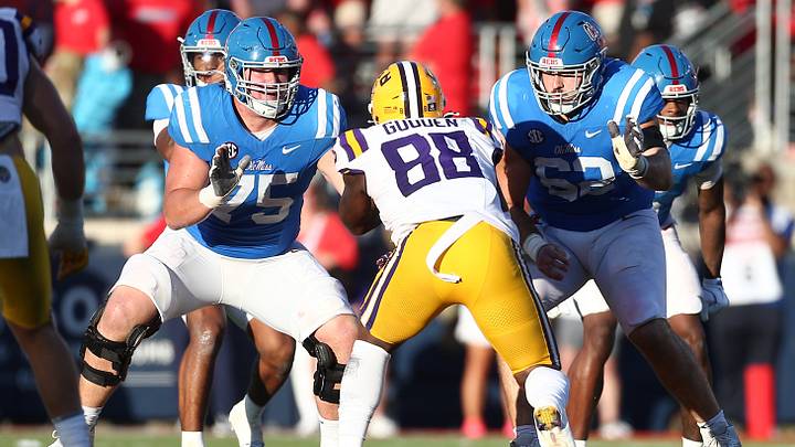 Sep 27, 2025; Oxford, Mississippi, USA; Mississippi Rebels offensive lineman Patrick Kutas (75) and offensive lineman Brycen Sanders (62) block LSU Tigers defensive lineman Bernard Gooden (88) during the fourth quarter at Vaught-Hemingway Stadium. Mandatory Credit: Petre Thomas-Imagn Images Sep 27, 2025; Oxford, Mississippi, USA; Mississippi Rebels offensive lineman Patrick Kutas (75) and offensive lineman Brycen Sanders (62) block LSU Tigers defensive lineman Bernard Gooden (88) during the fourth quarter at Vaught-Hemingway Stadium. Mandatory Credit: Petre Thomas-Imagn Images
