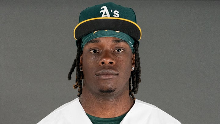Feb 23, 2023; Mesa, AZ, USA; Oakland Athletics outfielder Lawrence Butler (77) poses for a portrait