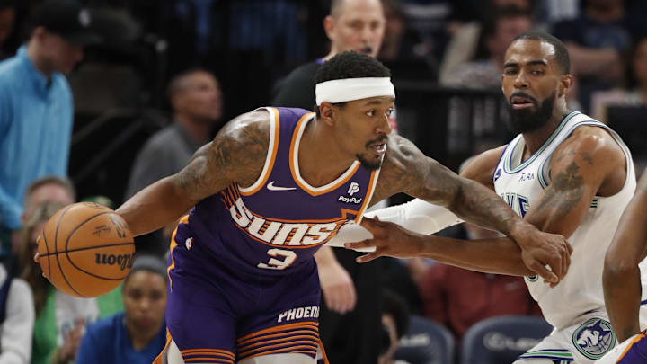Apr 14, 2024; Minneapolis, Minnesota, USA; Phoenix Suns guard Bradley Beal (3) works around