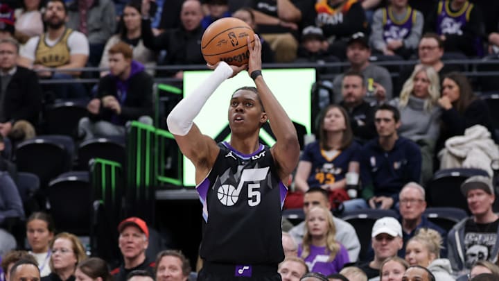 Mar 14, 2025; Salt Lake City, Utah, USA;  Utah Jazz forward Cody Williams (5) shoots the ball during the first quarter against the Toronto Raptors at Delta Center. Mandatory Credit: Chris Nicoll-Imagn Images