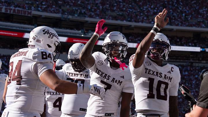 Oct 24, 2026; Tuscaloosa, AL, USA;  Texas A&M quarterback Marcel Reed (10) celebrates his running touchdown with teammates during the game with Alabama at Saban Field at Bryant Denny Stadium. Mandatory Credit: Gary Cosby Jr.-Tuscaloosa News