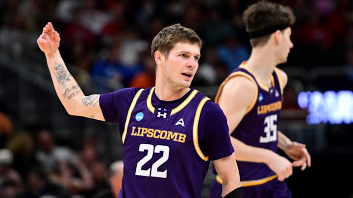 Mar 21, 2025; Milwaukee, WI, USA; Lipscomb Bisons guard Joe Anderson (22) reacts after a basket during the first half of a first round NCAA men’s tournament game against the Iowa State Cyclones at Fiserv Forum. Mandatory Credit: Benny Sieu-Imagn Images