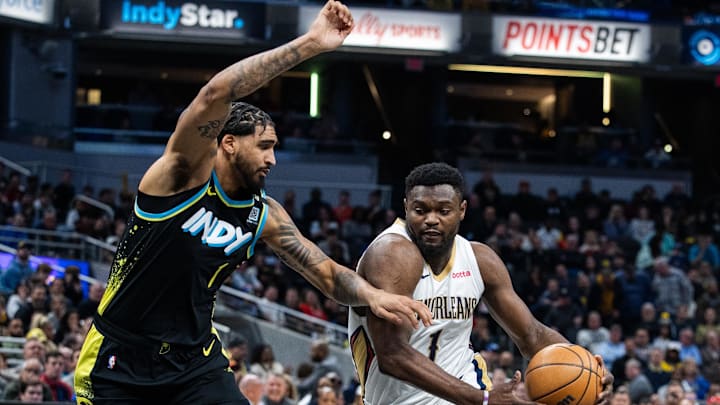 Feb 28, 2024; Indianapolis, Indiana, USA; New Orleans Pelicans forward Zion Williamson (1) dribbles the ball while Indiana Pacers forward Obi Toppin (1) defends in the first half at Gainbridge Fieldhouse. Mandatory Credit: Trevor Ruszkowski-Imagn Images Feb 28, 2024; Indianapolis, Indiana, USA; New Orleans Pelicans forward Zion Williamson (1) dribbles the ball while Indiana Pacers forward Obi Toppin (1) defends in the first half at Gainbridge Fieldhouse. Mandatory Credit: Trevor Ruszkowski-Imagn Images