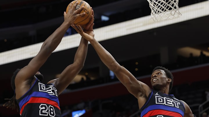 Jan 17, 2024; Detroit, Michigan, USA;  Detroit Pistons center Isaiah Stewart (28) and center Jalen Duren (0) go for the rebound in the first half at Little Caesars Arena. Mandatory Credit: Rick Osentoski-Imagn Images