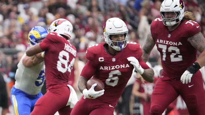 Arizona Cardinals running back James Conner (6) runs against the Los Angeles Rams during the first quarter at State Farm Stadium on Sept. 15, 2024.