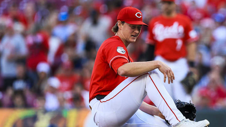 May 12, 2026; Cincinnati, Ohio, USA; Cincinnati Reds starting pitcher Brady Singer (51) reacts after getting hit by a single hit by Washington Nationals outfielder Daylen Lile (not pictured) in the second inning at Great American Ball Park. Mandatory Credit: Katie Stratman-Imagn Images