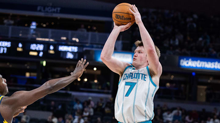 Feb 26, 2026; Indianapolis, Indiana, USA;  Charlotte Hornets guard Kon Knueppel (7) shoots the ball in the first half against the Indiana Pacers  at Gainbridge Fieldhouse. Mandatory Credit: Trevor Ruszkowski-Imagn Images
