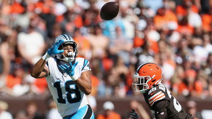 Carolina Panthers wide receiver Jalen Coker (18) makes a catch defended by Cleveland Browns cornerback Mekhi Blackmon (29) during the second quarter at Huntington Bank Field.  Mandatory Credit: Scott Galvin-Imagn Images