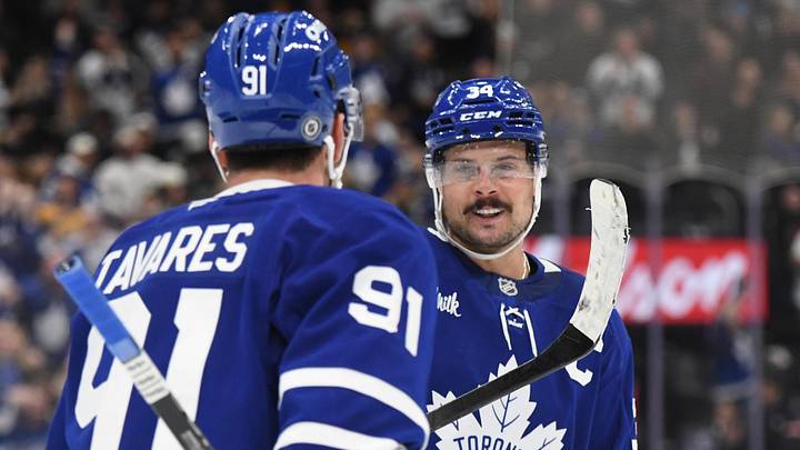 Dec 4, 2024; Toronto, Ontario, CAN;  Toronto Maple Leafs forward Auston Matthews (34) celebrates with forward John Tavares (91) after a win over the Nashville Predators at Scotiabank Arena. Mandatory Credit: Dan Hamilton-Imagn Images