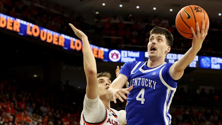 Feb 21, 2026; Auburn, Alabama, USA; Kentucky Wildcats forward Andrija Jelavic (4) gets past Auburn Tigers forward Filip Jovic (38) for a shot during the first half at Neville Arena. Mandatory Credit: John Reed-Imagn Images Feb 21, 2026; Auburn, Alabama, USA; Kentucky Wildcats forward Andrija Jelavic (4) gets past Auburn Tigers forward Filip Jovic (38) for a shot during the first half at Neville Arena. Mandatory Credit: John Reed-Imagn Images