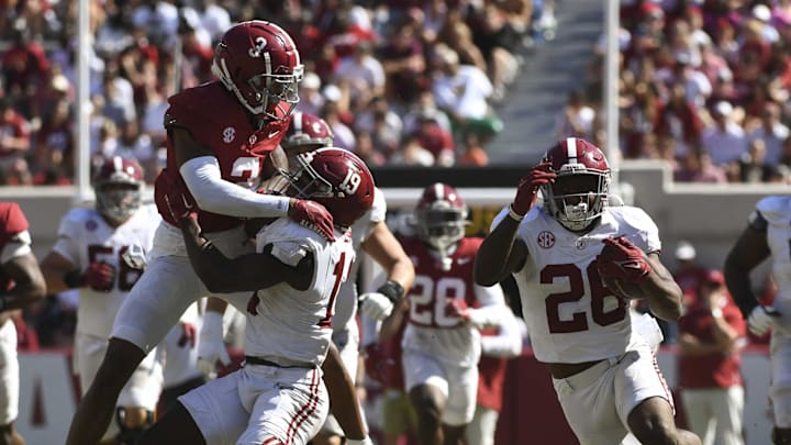Apr 13, 2024; Tuscaloosa, AL, USA;  Alabama running back Jam Miller (26) runs the ball behind a