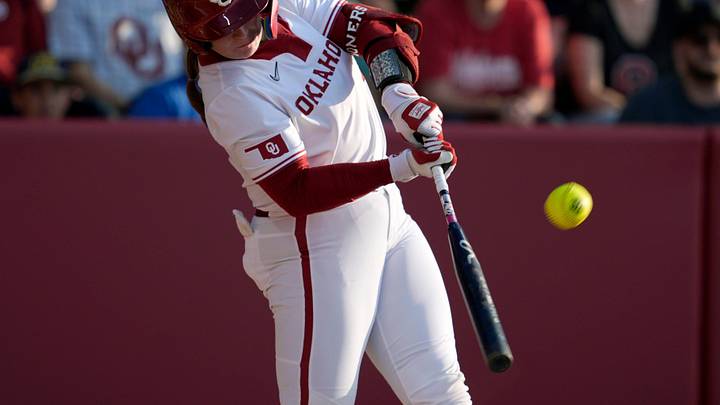 Oklahoma catcher Kendall Wells blasts a home run against Kentucky at Love's Field.