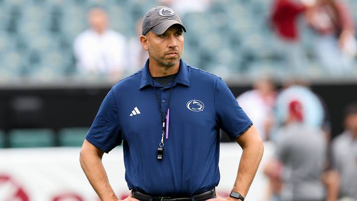 Penn State Nittany Lions head coach Matt Campbell stands on the field during a warmup prior to the game against the Temple Owls at Lincoln Financial Field. 