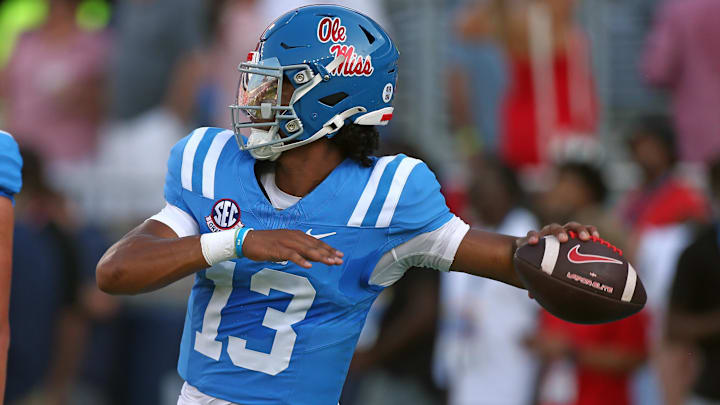 8Sep 13, 2025; Oxford, Mississippi, USA; Mississippi Rebels quarterback Austin Simmons (13) passes the ball during warm ups prior to the game against the Arkansas Razorback at Vaught-Hemingway Stadium. Mandatory Credit: Petre Thomas-Imagn Images