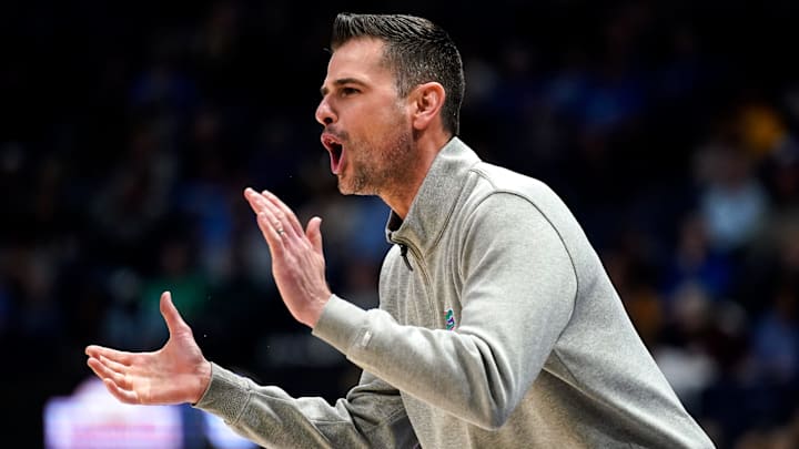 Florida head coach Todd Golden works with his team during the first half of an SEC tournament semifinal game against Texas A&M at Bridgestone Arena in Nashville, Tenn., Saturday, March 16, 2024.