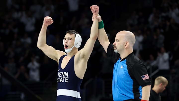 Penn State Nittany Lion Luke Lilledahl has his arm raised after winning the 125-pound title at the 2025 Big Ten Wrestling Championships. 