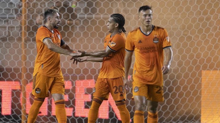 Aug 13, 2022; Houston, Texas, USA; Houston Dynamo FC midfielder Hector Herrera (16) and midfielder