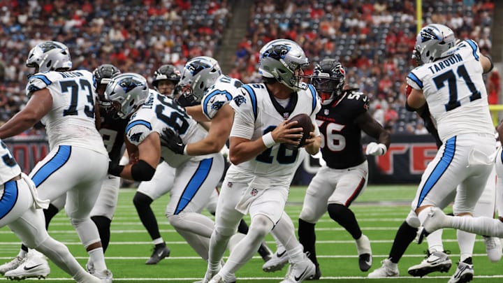Aug 16, 2025; Houston, Texas, USA; Carolina Panthers quarterback Jack Plummer (16) bootlegs right against the Houston Texans in the second half at NRG Stadium. Mandatory Credit: Thomas Shea-Imagn Images