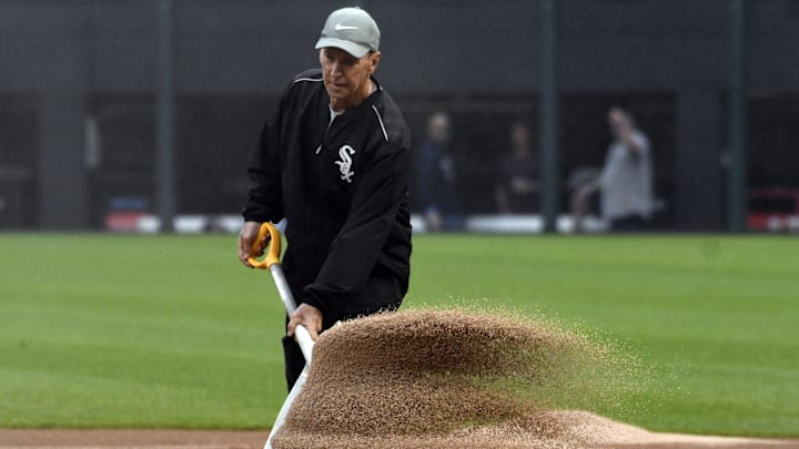 Chicago White Sox groundskeeper Roger Bossard prepares the field for a game against the New York Yankees in 2019.
