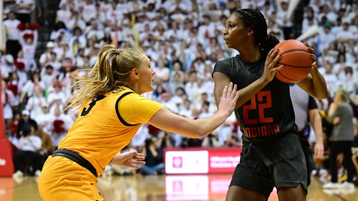 Indiana Hoosiers guard Chloe Moore-McNeil (22) looks to get the ball past Iowa Hawkeyes guard Sydney Affolter (3) during the second half at Simon Skjodt Assembly Hall.