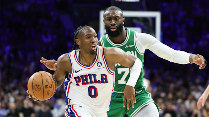 76ers guard Tyrese Maxey drives past Celtics guard Jaylen Brown.