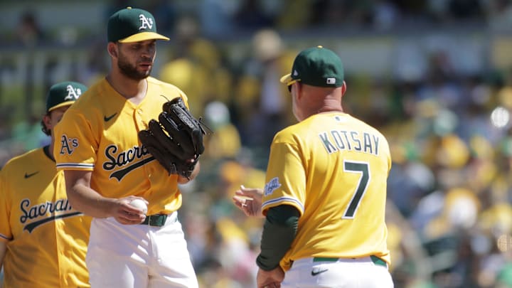 Apr 4, 2026; West Sacramento, California, USA; Athletics manager Mark Kotsay (7) pulls Athletics pitcher Luis Morales (19) out of the game during the fourth inning against the Houston Astros at Sutter Health Park. Mandatory Credit: Scott Marshall-Imagn Images