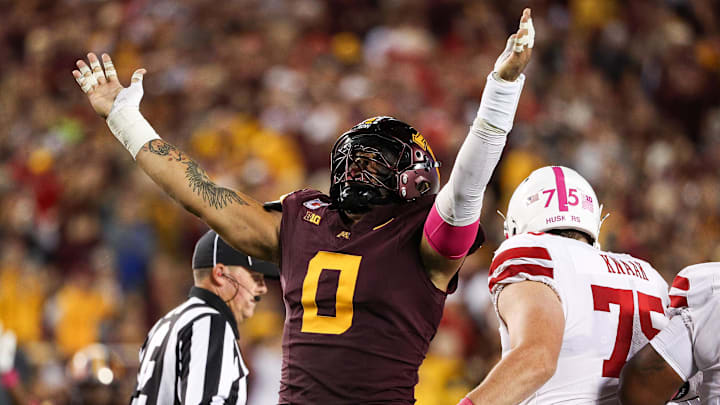 Minnesota Golden Gophers defensive lineman Anthony Smith celebrates a sack against Nebraska Cornhuskers quarterback Dylan Raiola. Minnesota Golden Gophers defensive lineman Anthony Smith celebrates a sack against Nebraska Cornhuskers quarterback Dylan Raiola.