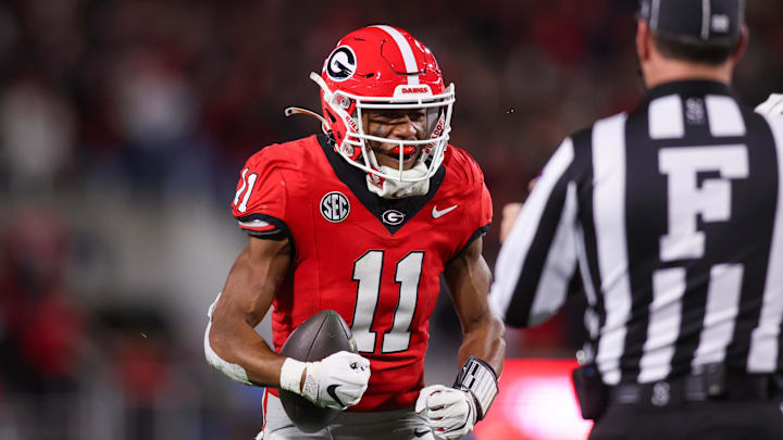 Nov 29, 2024; Athens, Georgia, USA; Georgia Bulldogs wide receiver Arian Smith (11) reacts after a run against the Georgia Tech Yellow Jackets in the third quarter at Sanford Stadium. Mandatory Credit: Brett Davis-Imagn Images Nov 29, 2024; Athens, Georgia, USA; Georgia Bulldogs wide receiver Arian Smith (11) reacts after a run against the Georgia Tech Yellow Jackets in the third quarter at Sanford Stadium. Mandatory Credit: Brett Davis-Imagn Images