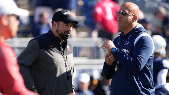 Oct 29, 2022; University Park, Pennsylvania, USA; Ohio State Buckeyes head coach Ryan Day talks to Penn State Nittany Lions head coach James Franklin prior to the NCAA Division I football game at Beaver Stadium. Mandatory Credit: Adam Cairns-The Columbus Dispatch