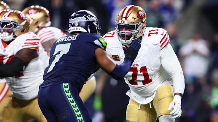 Jan 17, 2026; Seattle, WA, USA; San Francisco 49ers offensive tackle Trent Williams (71) blocks Seattle Seahawks linebacker Uchenna Nwosu (7) during the first half in an NFC Divisional Round game at Lumen Field. Mandatory Credit: Kevin Ng-Imagn Images