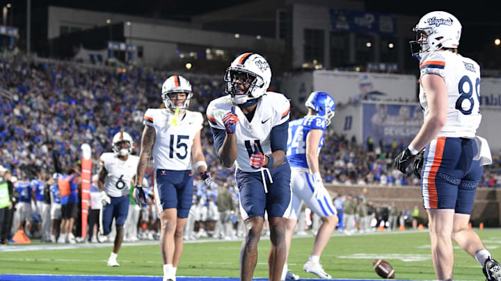 Nov 15, 2025; Durham, North Carolina, USA; Virginia Cavaliers wide receiver Trell Harris (11) celebrates a touchdown against the Duke Blue Devils in the third quarter at Wallace Wade Stadium. Mandatory Credit: Zachary Taft-Imagn Images Nov 15, 2025; Durham, North Carolina, USA; Virginia Cavaliers wide receiver Trell Harris (11) celebrates a touchdown against the Duke Blue Devils in the third quarter at Wallace Wade Stadium. Mandatory Credit: Zachary Taft-Imagn Images