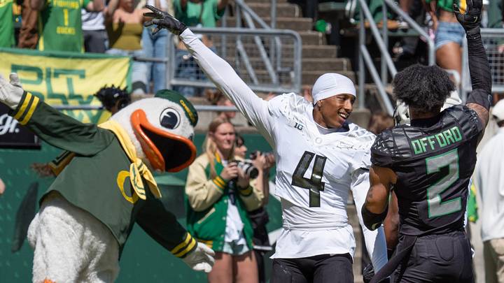 Oregon’s Jamari Johnson, center, scores for the Combat Ducks during the Oregon Spring Game at Autzen Stadium in Eugene April 25, 2026
