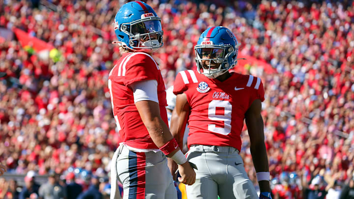 Sep 7, 2024; Oxford, Mississippi, USA; Mississippi Rebels quarterback Jaxson Dart (2) and Mississippi Rebels wide receiver Tre Harris (9) react after a touchdown during the second half against the Middle Tennessee Blue Raiders at Vaught-Hemingway Stadium. Mandatory Credit: Petre Thomas-Imagn Images