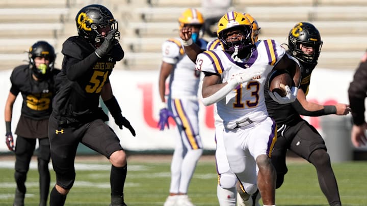 Dec 6, 2024; Birmingham, AL, USA; Cherokee County's Dylan Duncan (51) pursues Jackson's Ezavier Crowell (13) at Protective Stadium in the AHSAA 4A State Championship game.