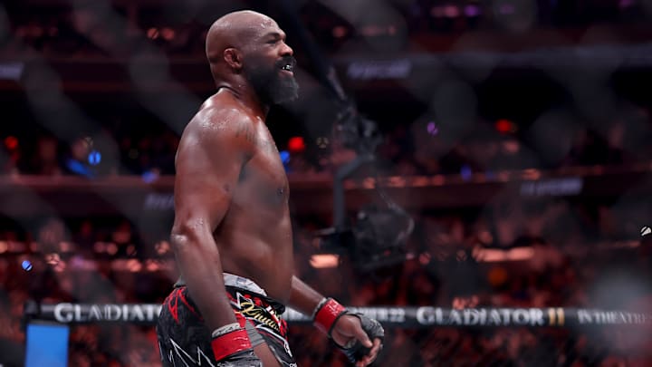 Nov 16, 2024; New York, NY, USA; Jon Jones (red gloves) reacts after defeating Stipe Miocic (not pictured) in the heavyweight bout during UFC 309 at Madison Square Garden.