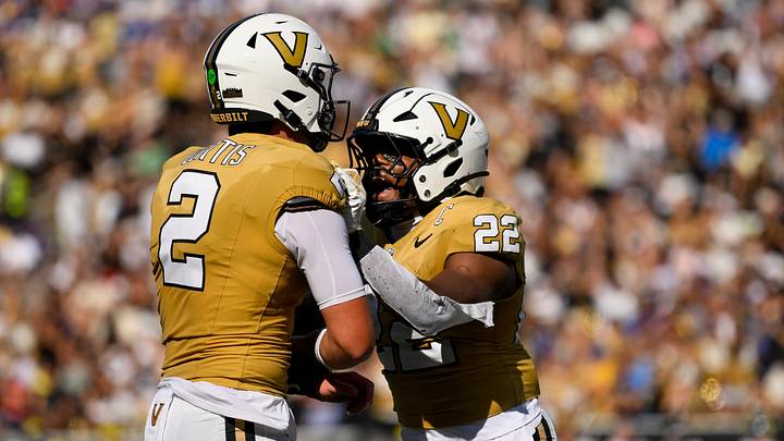 Sep 12, 2026; Nashville, Tennessee, USA; Vanderbilt Commodores quarterback Jared Curtis (2) celebrates his touchdown with running back Makhilyn Young (22) during the first half at FirstBank Stadium. Mandatory Credit: Steve Roberts-Imagn Images Sep 12, 2026; Nashville, Tennessee, USA; Vanderbilt Commodores quarterback Jared Curtis (2) celebrates his touchdown with running back Makhilyn Young (22) during the first half at FirstBank Stadium. Mandatory Credit: Steve Roberts-Imagn Images