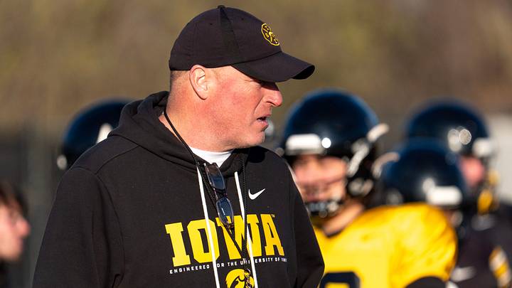 Iowa offensive line coach George Barnett watches players run drills during practice April 9, 2026 in Iowa City, Iowa.