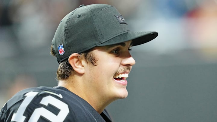 Jan 4, 2026; Paradise, Nevada, USA; Las Vegas Raiders quarterback Aidan O'Connell (12) walks off the field after the Raiders defeated the Kansas City Chiefs 14-12 at Allegiant Stadium. Mandatory Credit: Stephen R. Sylvanie-Imagn Images